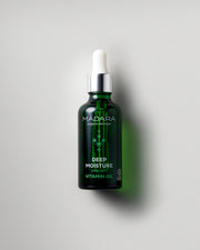 MÁDARA Organic Skincare deep moisture vitamin oil A2281 face oil product photo on plain background.