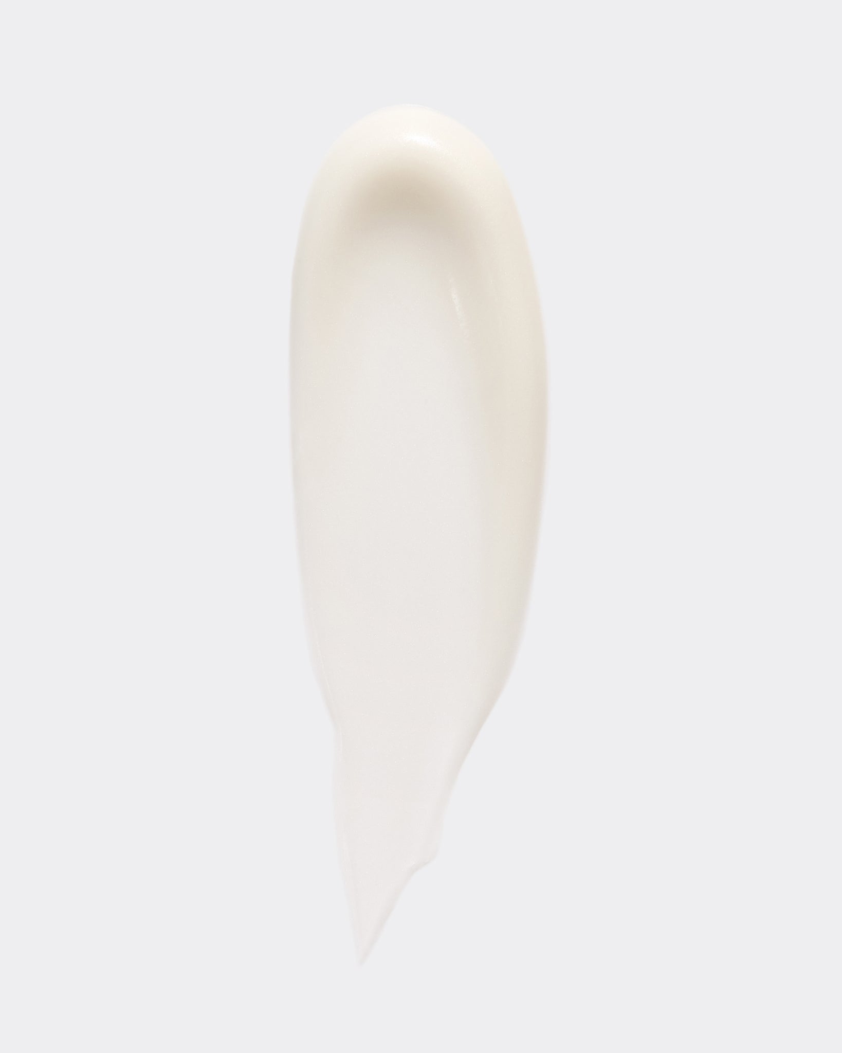 Model wearing MÁDARA Organic Skincare moisturising face cream A2221 face cream on skin; close-up portrait shows natural application results.