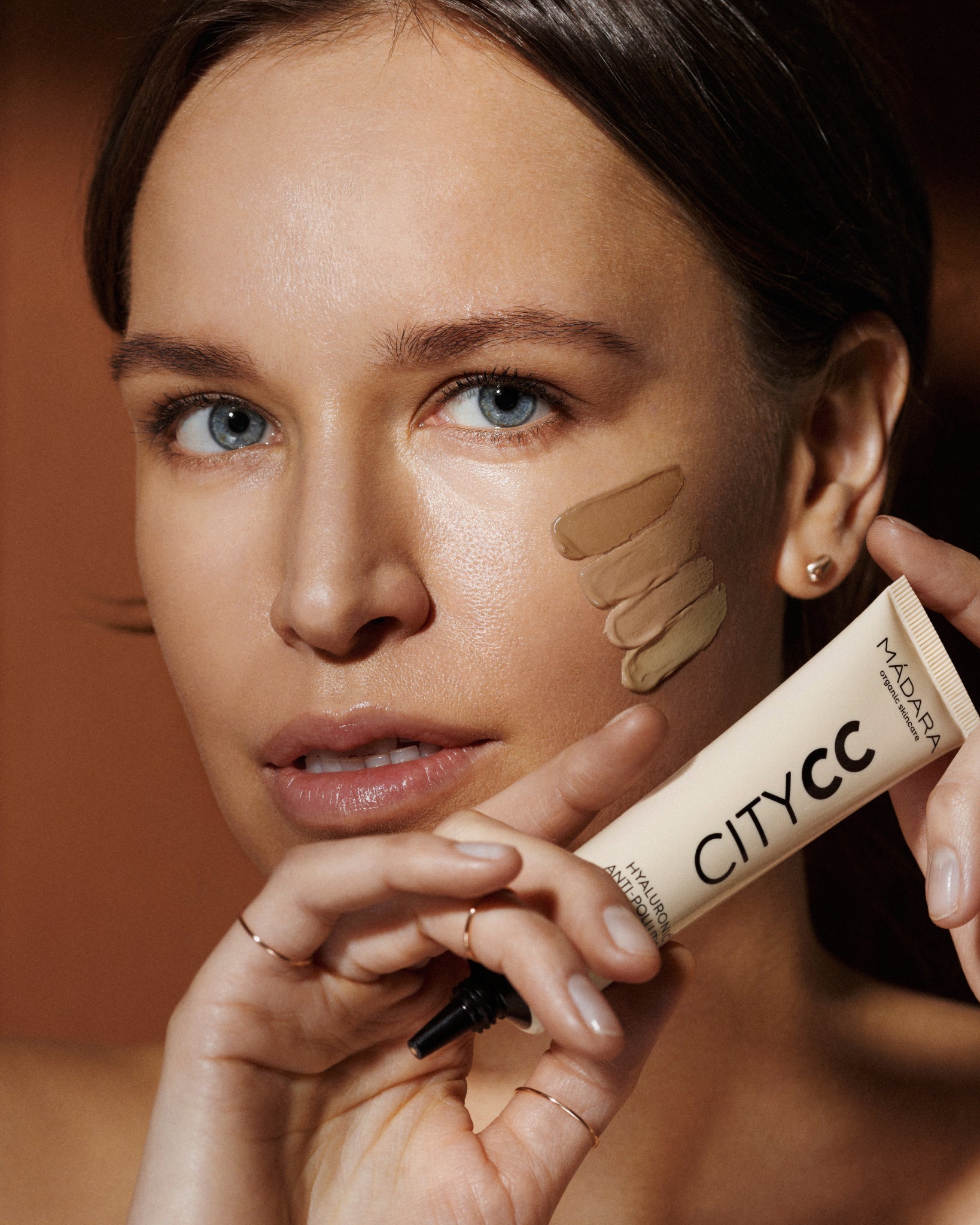 MÁDARA Organic Skincare spf 15 tinted cc cream A3411 mineral sunscreen product photo on plain background.