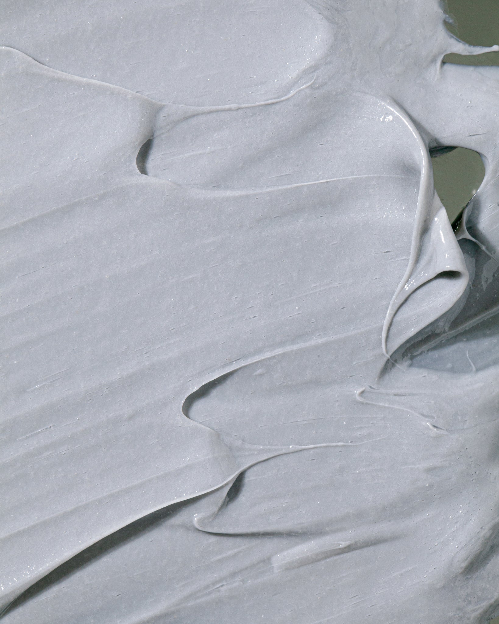 Texture close-up of MÁDARA Organic Skincare aha peel mask A2105 face mask �swatch demonstrates consistency and finish.