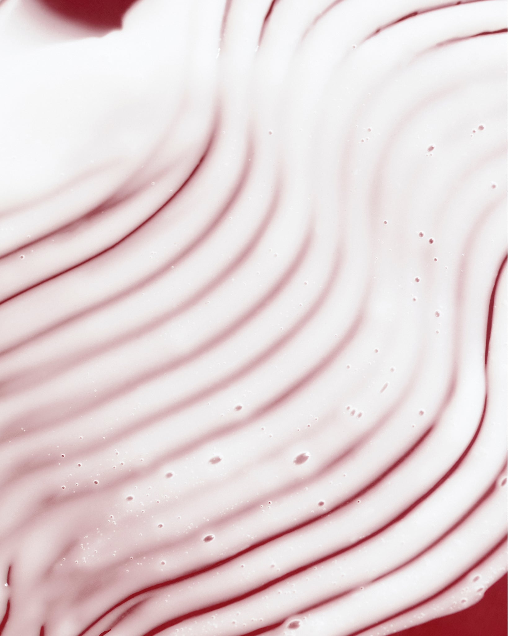 Texture close-up of MÁDARA Organic Skincare derma collagen peptides serum A3061 serum - swatch demonstrates consistency and finish.