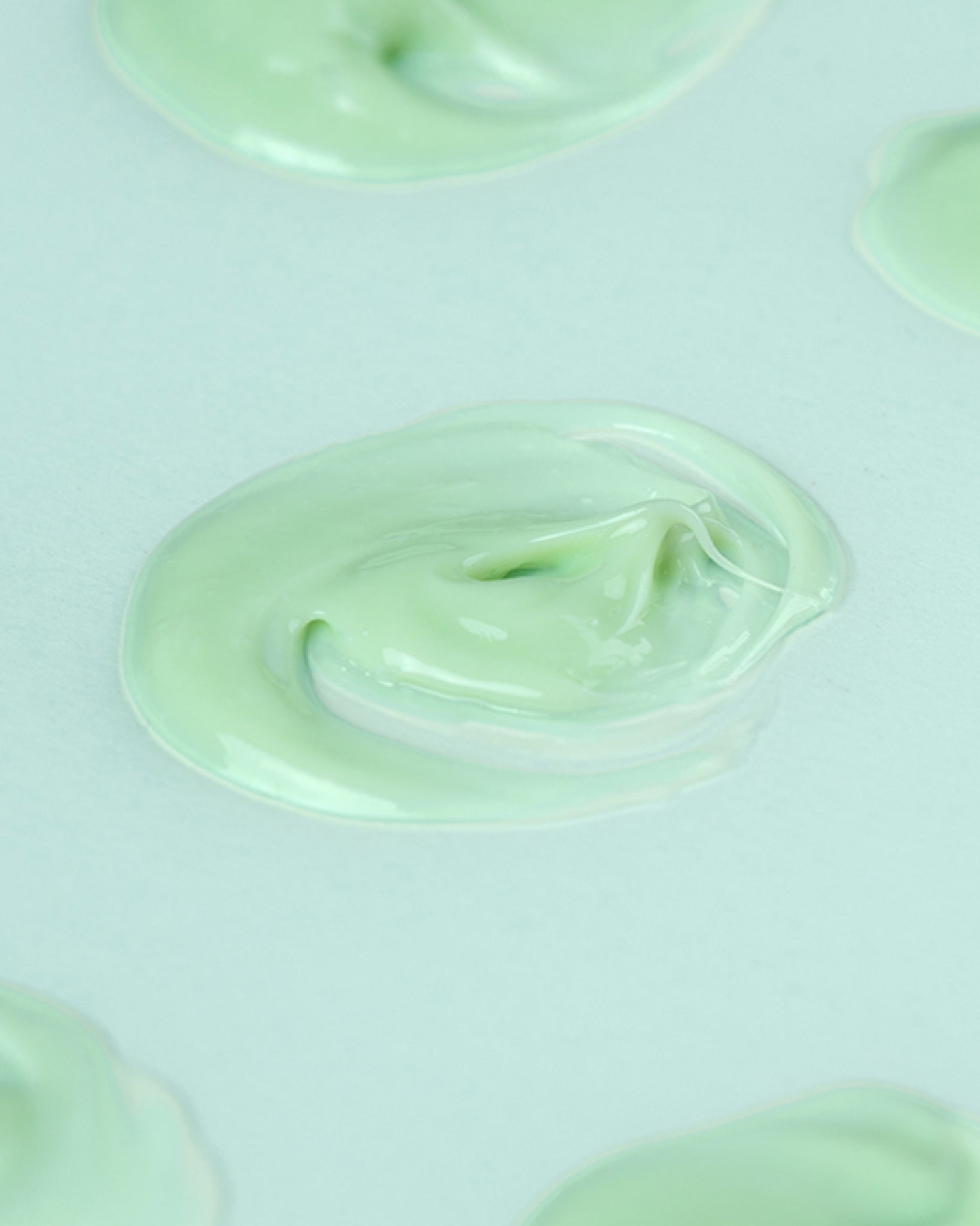 Texture close-up of MÁDARA Organic Skincare hydra derm fluid A2204 �swatch demonstrates consistency and finish.