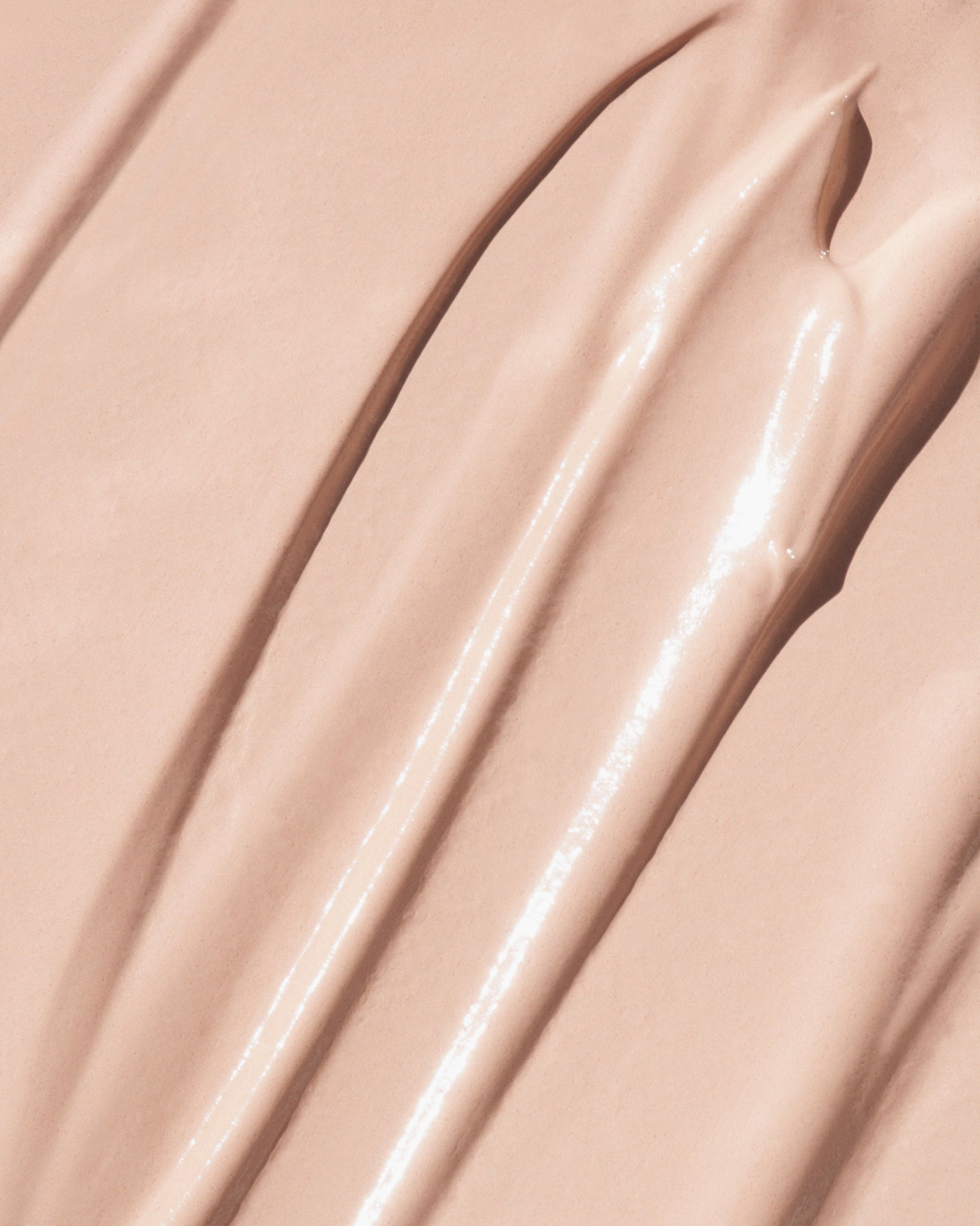 Texture close-up of MÁDARA Organic Skincare the concealer latte A6101 concealer �swatch demonstrates consistency and finish.