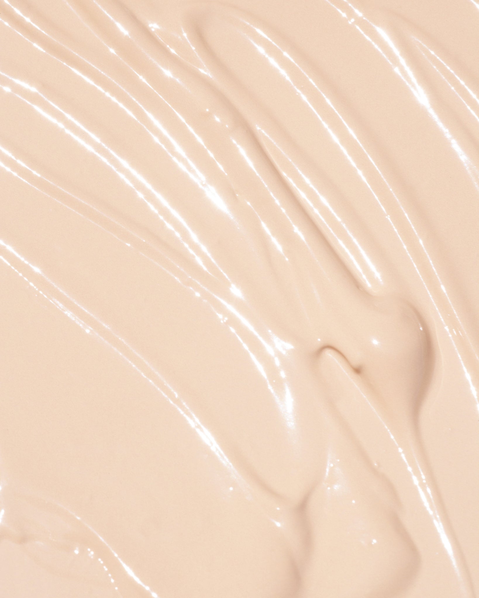 Texture close-up of MÁDARA Organic Skincare the concealer vanilla A6100 concealer �swatch demonstrates consistency and finish.