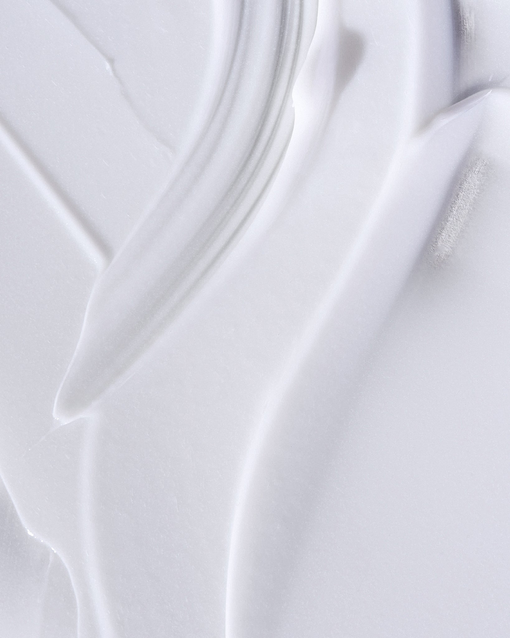 Texture close-up of MÁDARA Organic Skincare retinol alternative day cream A3350 face cream �swatch demonstrates consistency and finish.