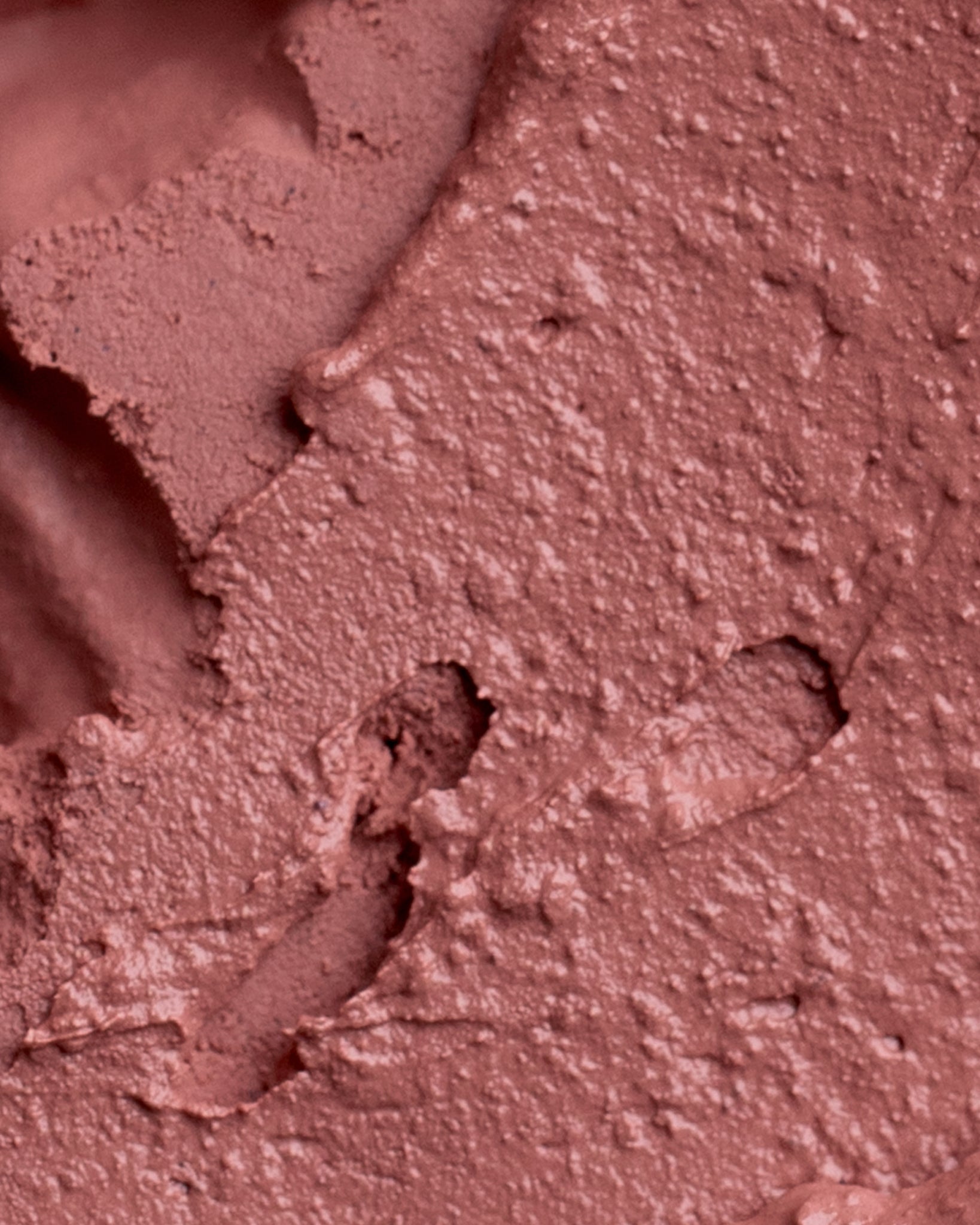 Texture close-up of MÁDARA Organic Skincare satin shine lipstick flattery A6501 �swatch demonstrates consistency and finish.