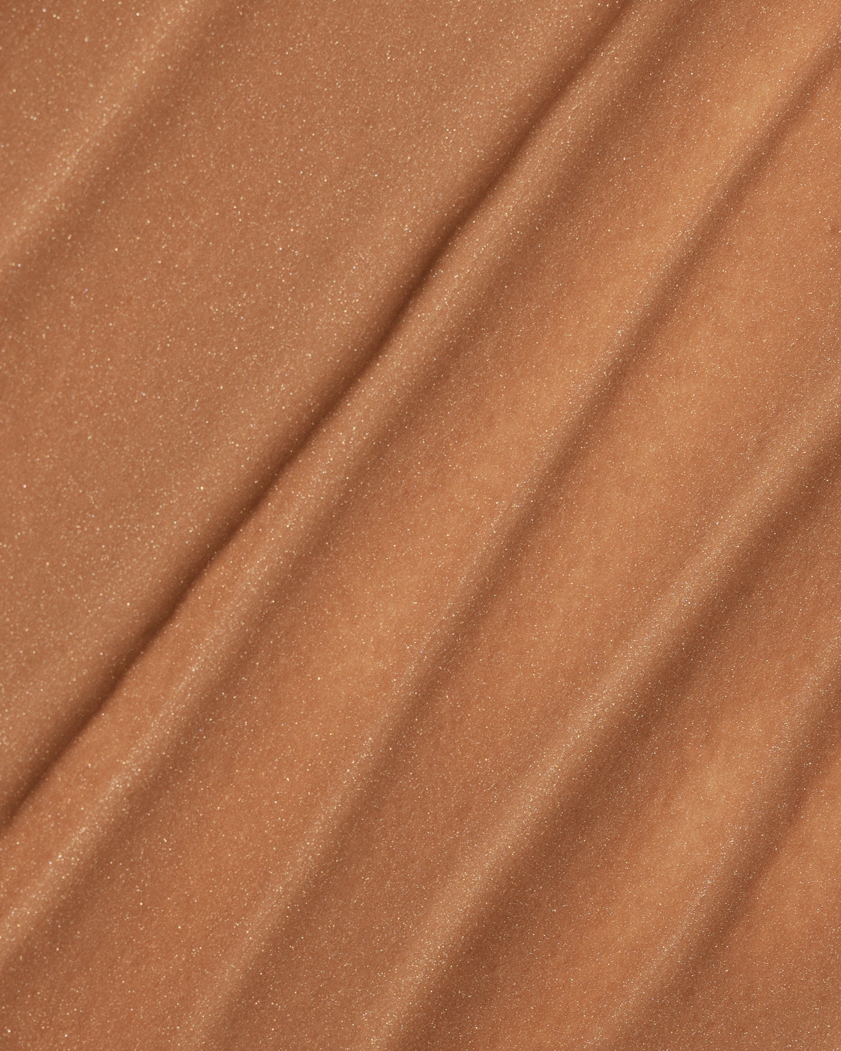 Texture close-up of MÁDARA Organic Skincare wild flower A3514 �swatch demonstrates consistency and finish.