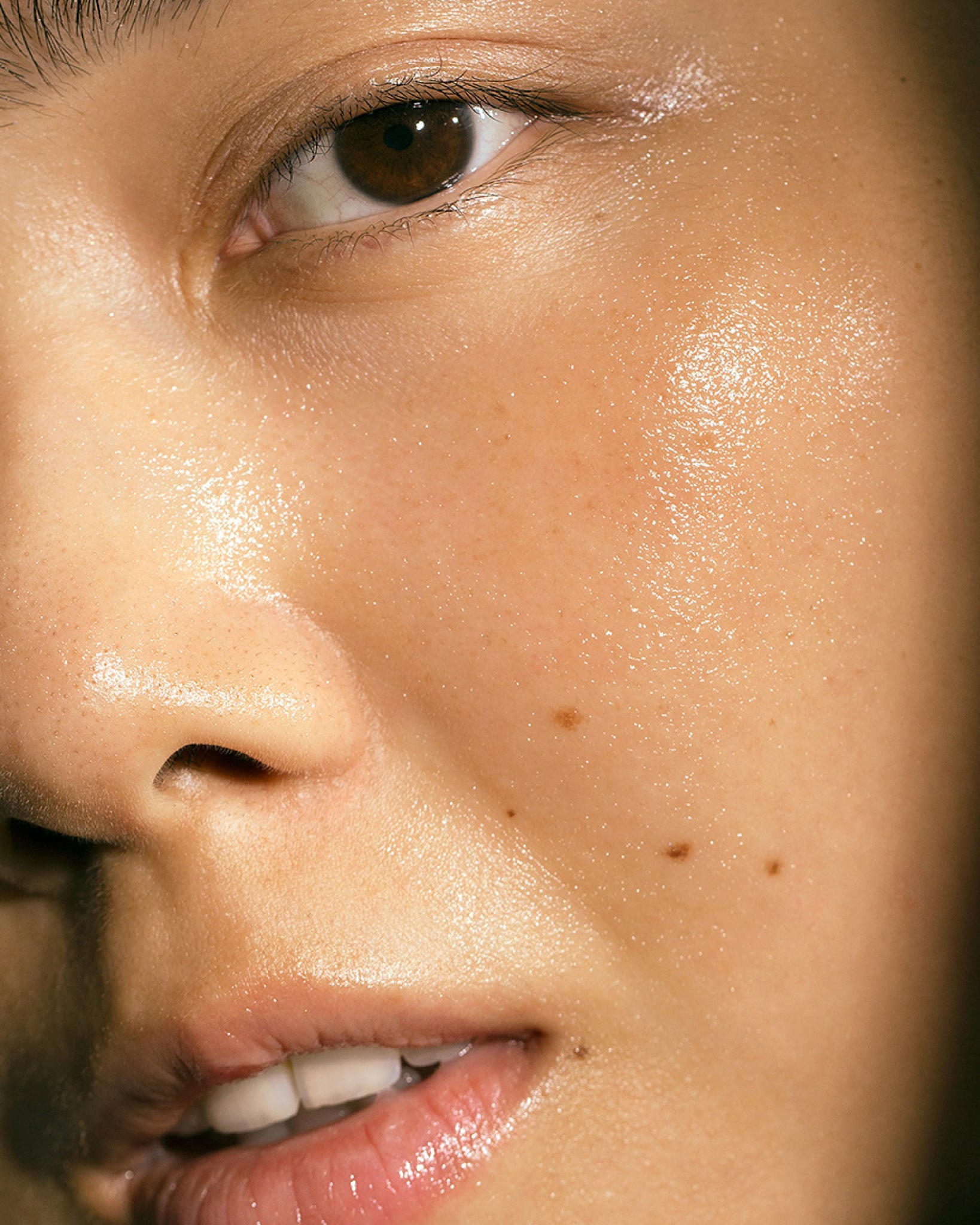 Model wearing MÁDARA Organic Skincare natural peel face mask A2105 face mask on skin; close-up portrait shows natural application results.