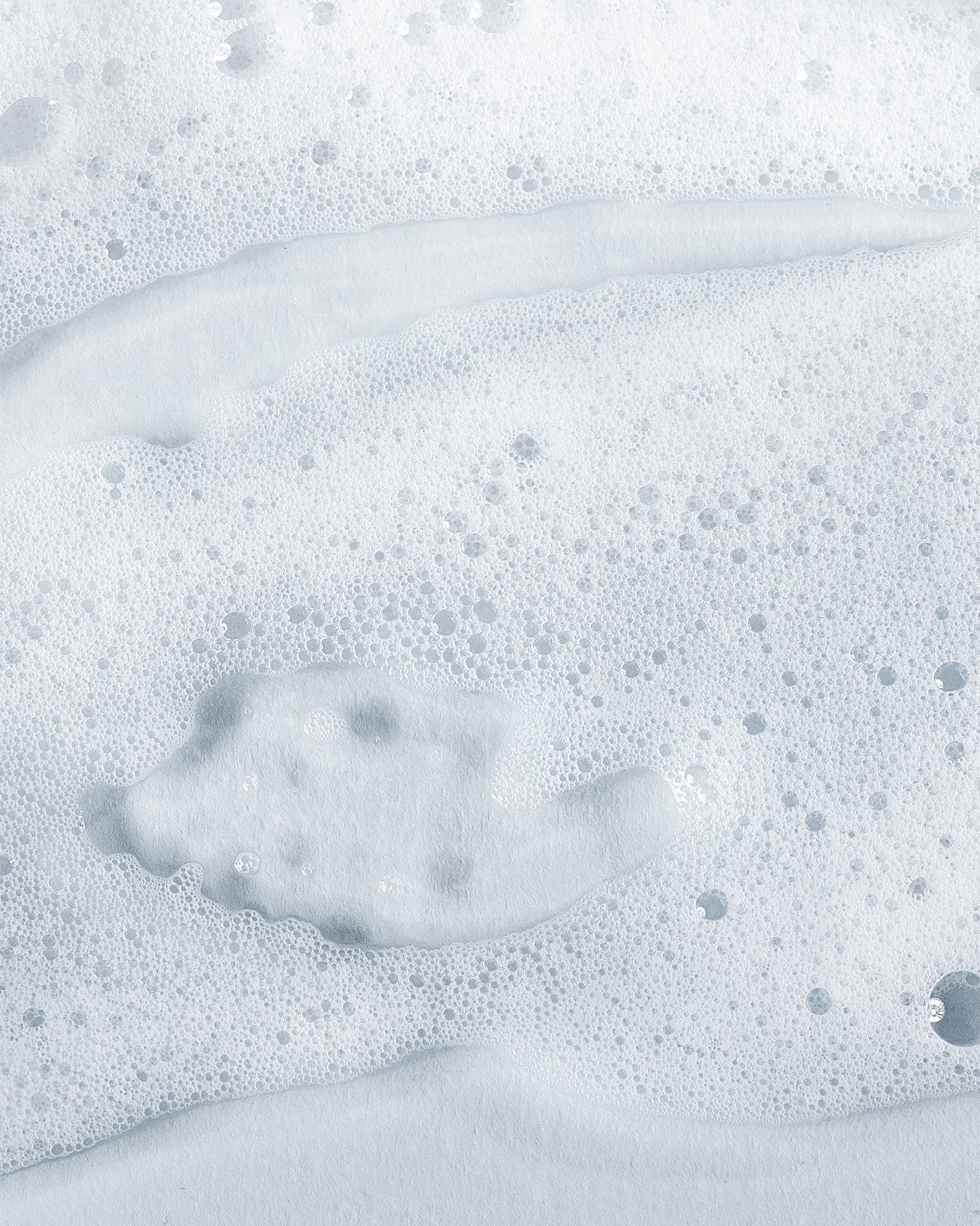 Texture close-up of MÁDARA Organic Skincare intim foam A1080 �swatch demonstrates consistency and finish.