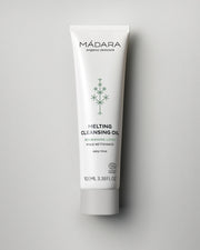 MÁDARA Organic Skincare melting cleansing oil A2003 face oil product photo on plain background.