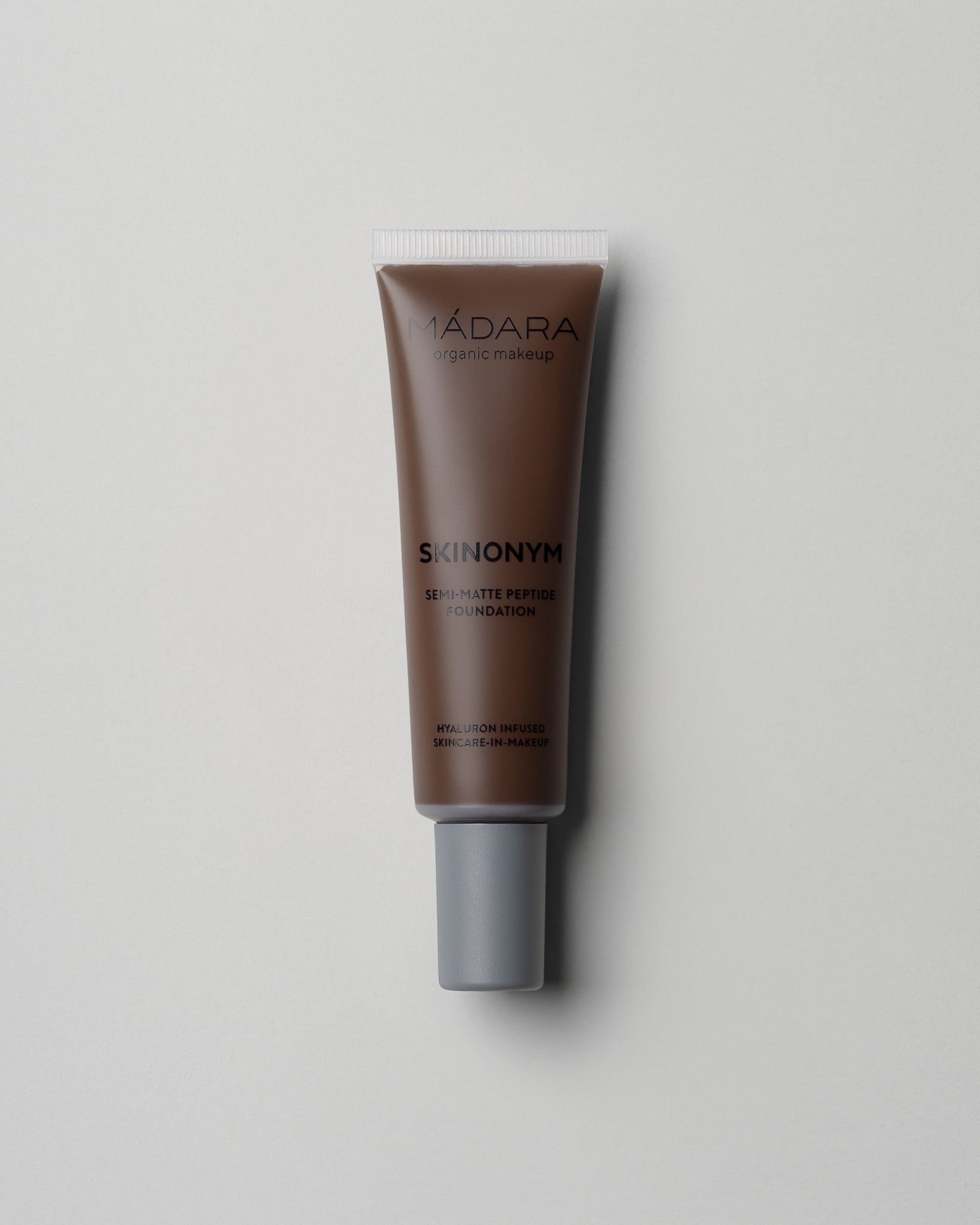 MÁDARA Organic Skincare skinonym foundation chestnut A6097 foundation product photo on plain background.
