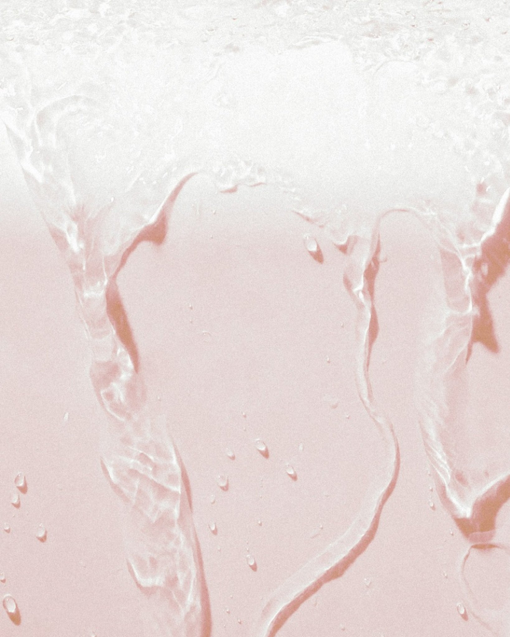 Texture close-up of MÁDARA Organic Skincare hydrating toner A2053 toner �swatch demonstrates consistency and finish.