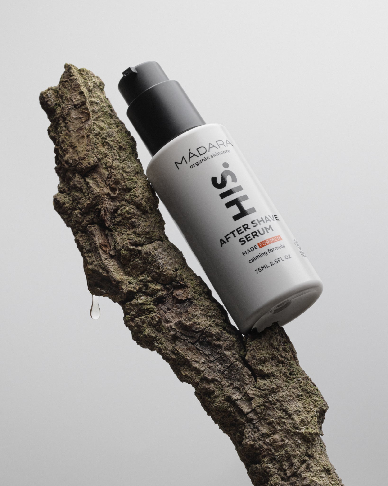 MÁDARA Organic Skincare calming after shave serum for men A5002 serum product photo on plain background.