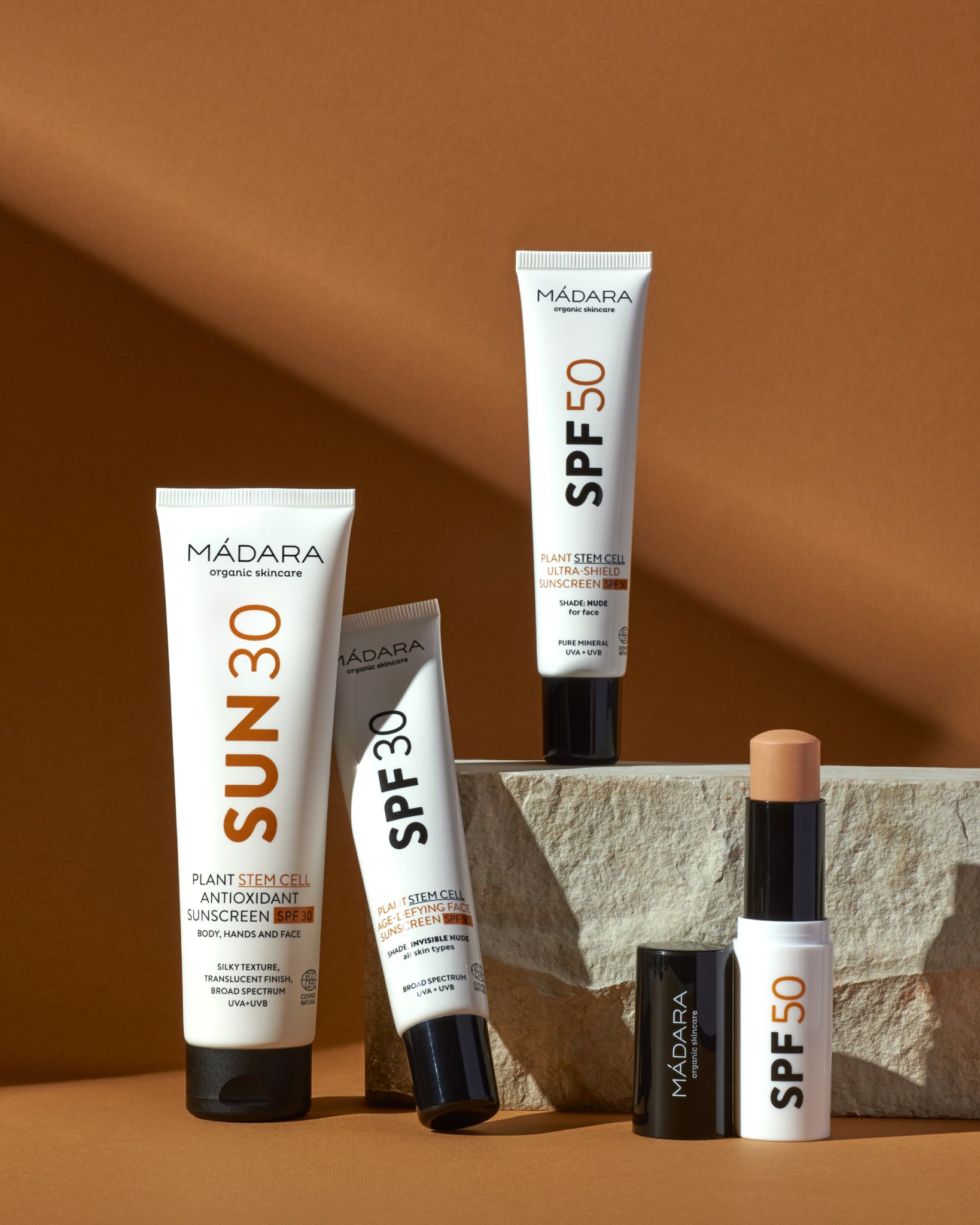 MÁDARA Organic Skincare spf products A3433 mineral sunscreen product photo on plain background.