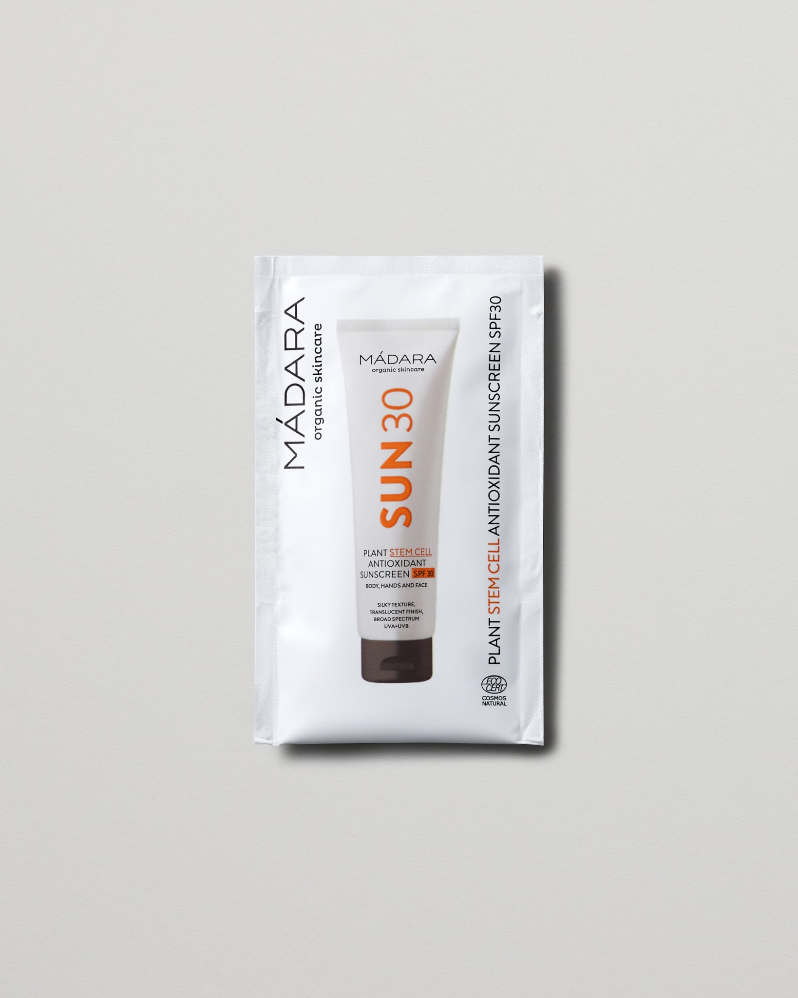 MÁDARA Organic Skincare plant stem cell antioxidant body sunscreen spf30 3ml mineral sunscreen product photo on plain background.